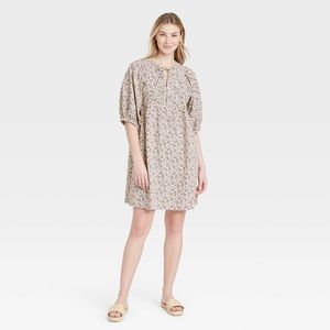 Floral baby doll dress with puff sleeves and pockets
